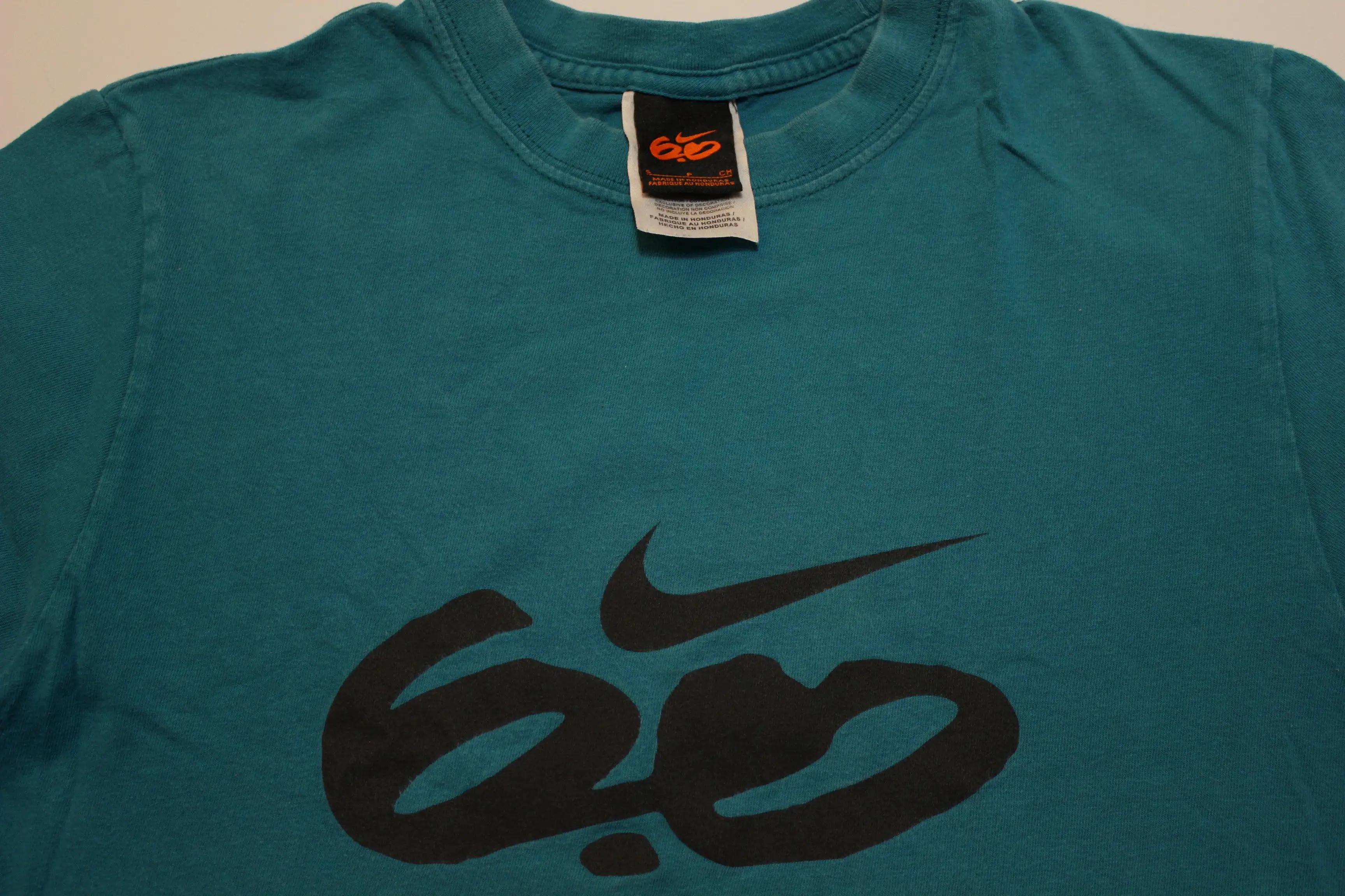 Nike 6.0 Center Swoosh Graphic Logo Short Sleeve T-Shirt